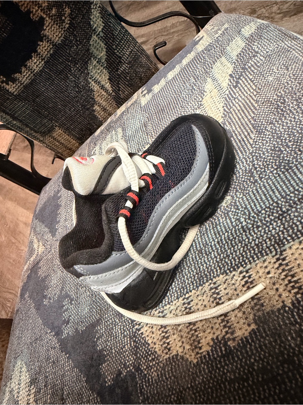 Kids Black and Gray Athletic Sneakers with White Laces and Red Accents